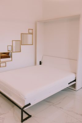 Custom-cut Murphy bed mattress by Tampa Mattress Makers on a horizontal foldout frame